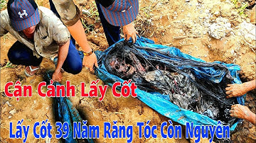 Cận cảnh lấy cốt mộ 39 năm tóc và óc trong đầu còn nguyên