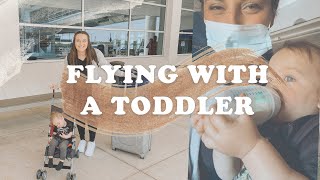 FLYING ALONE WITH A TODDLER + TRAVEL TIPS