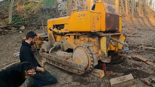 Fixing a John Deere 450 track and building a crane