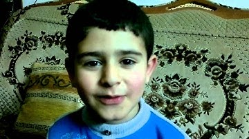 طفل يقرا سورة التين