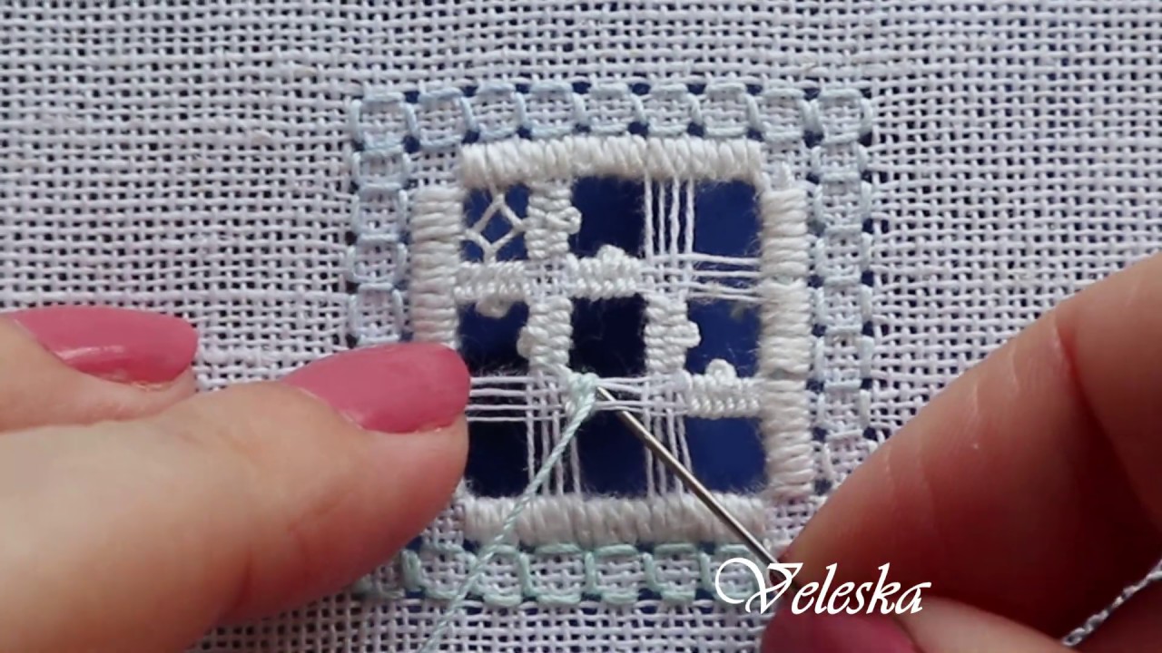 Woven bars with Picots on one side and Dove`s eye  stitch. Hardanger filling