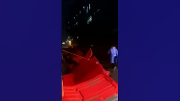Chinese residents in Guangzhou topple barriers amid new COVID restrictions