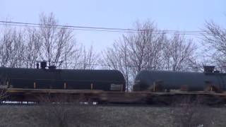 CSX Q018 Van Train Powers By on Raised Tracks