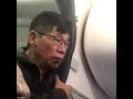 Airport security guards violently removing an Asian man