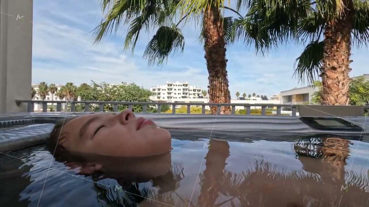 Boy relaxing in a hot tub