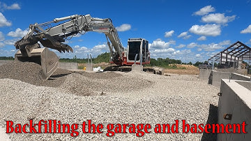 Backfilling The Garage With Rock And Starting To Backfill Around The Basement