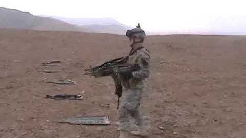 Army Soldier dual-wields some M249