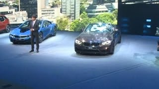 raw: bmw chief collapses during car show event