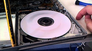 Macbook Pro testing Superdrive CD and DVD wide open