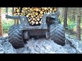 Valtra forestry tractor with big homemade trailer