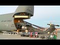 Loading HH-60 Pavehawk Helicopters onto a C-5 Galaxy Cargo Aircraft