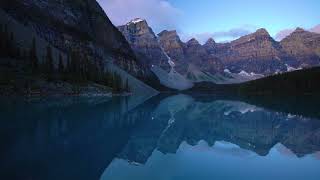 Mountains Reflection In Pristine Moraine Lake