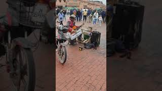 Artist Plays Multiple Musical Instruments on Street - 1497601