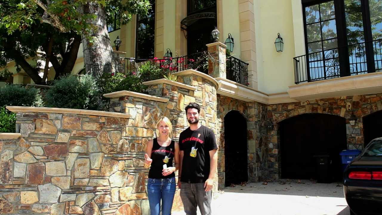 Emily and Nick from Rock & Brews at Gene Simmons' house. 