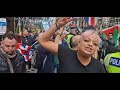 Patriotic women sings royal britanniaat palistian protesters london
