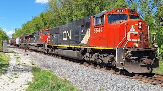 SD75I Leads A Grain Train!