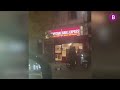 Brazen crook on moped uses angle grinder to steal bike as shocked onlookers watch on