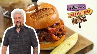 Guy Fieri Eats a Bacon, Brisket & Pulled Pork Sandwich | Diners, DriveIns and Dives | Food Network