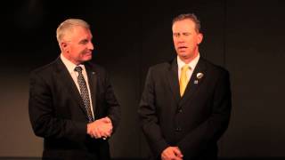 Athletics Director introduces new head football coach