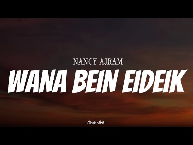 NANCY AJRAM - Wana Bein Eideik | ( Video Lirik ) class=