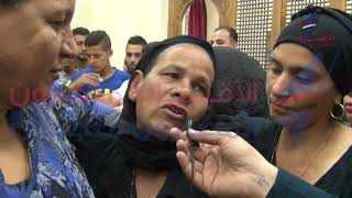 بكاء أهالي شهداء ليبيا بعد وصول أجساد ذويهم  إلي كنيسة العور بالمنيا