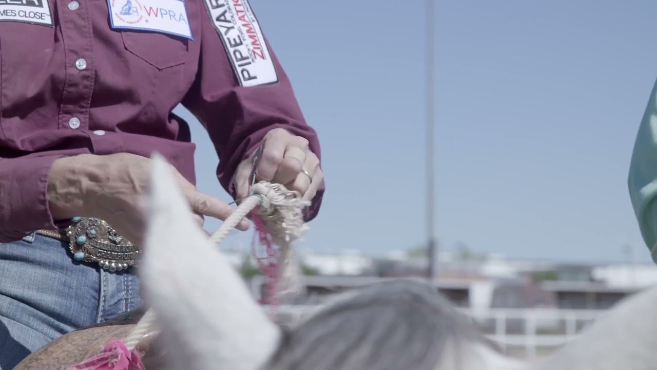 Using a Friend to Help Tie Your Breakaway Rope to