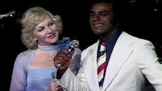 Johnny Mathis and Line Renaud - Sing A Song . In Paris . 1975 .