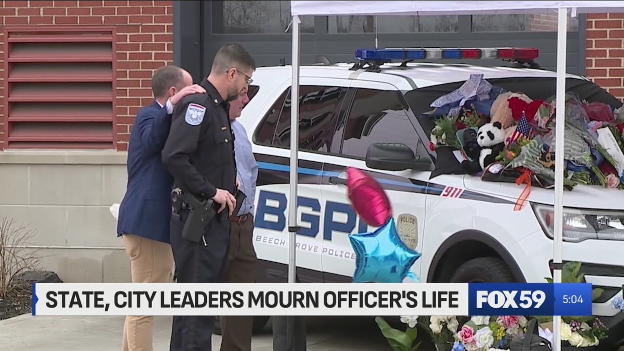 State, city officials mourn fallen Beech Grove officer's life - YouTube