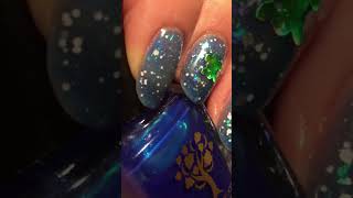 Blue jelly sandwich nails with added turtles from Charlies nail art