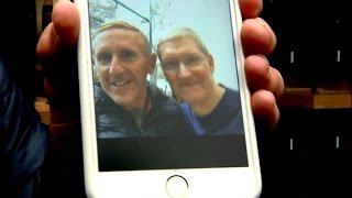 CEO Tim Cook takes selfies with Apple iPhone 7 customers in Palo Alto