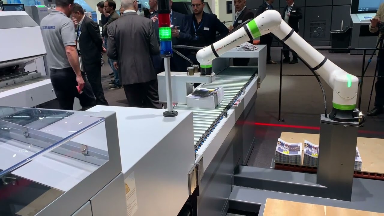Stahlfolder TH82 with robotic C- Stacker at Drupa