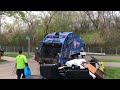 Rear Loader Garbage Truck Packing Out On Bulk Waste- Spring Clean Up