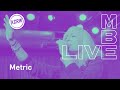 Metric performing "Breathing Underwater" live on KCRW