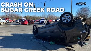 Crash on Sugar Creek Road in Charlotte sees car flipped over