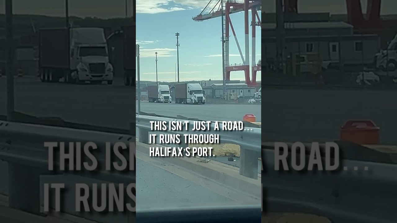 Driving Marginal Road through Halifax’s working port cranes, trucks, containers and cruise ships.