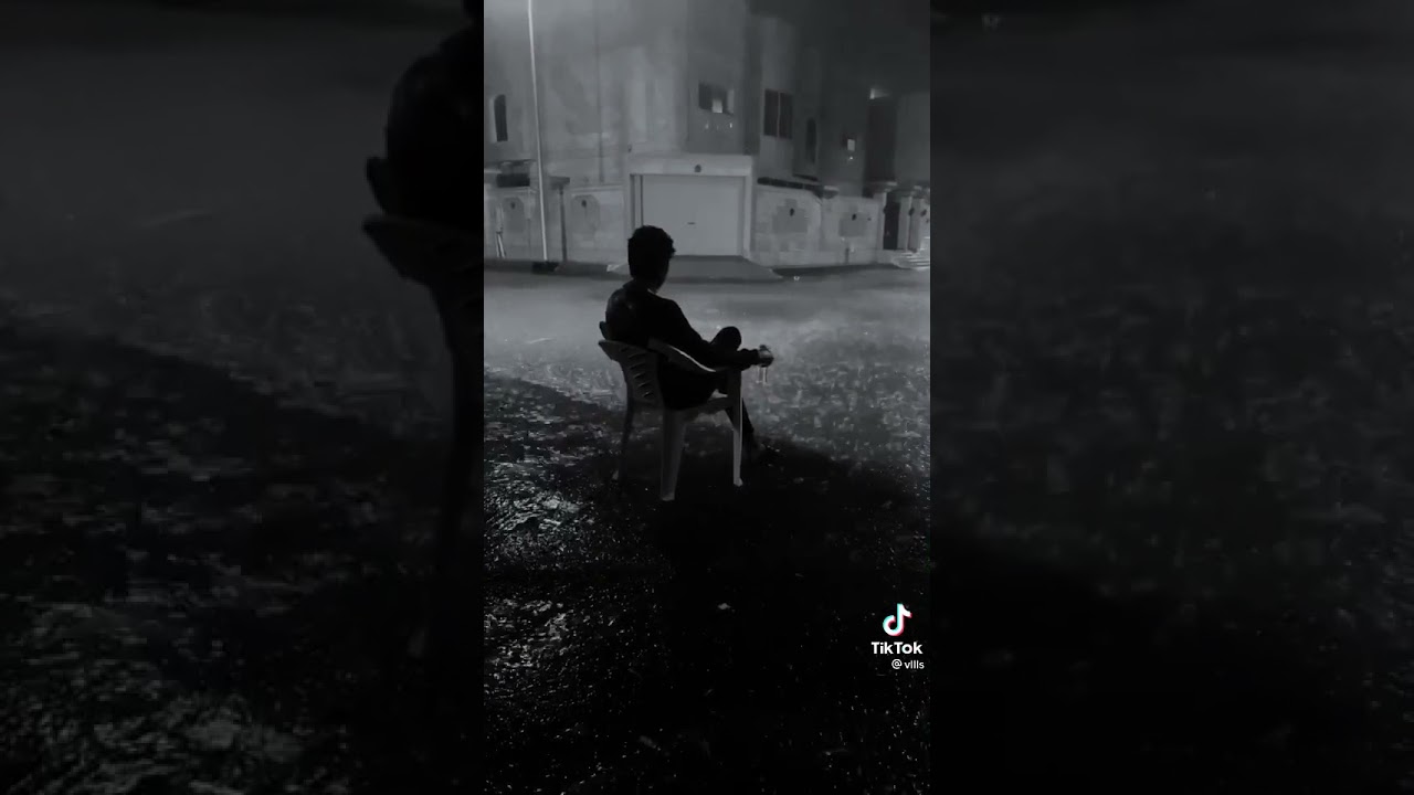Guy sitting in the rain YouTube