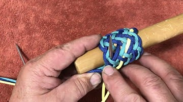 Tying a 3 pass Hood Knot in a 7 Part 6 Bight Casa Knot.