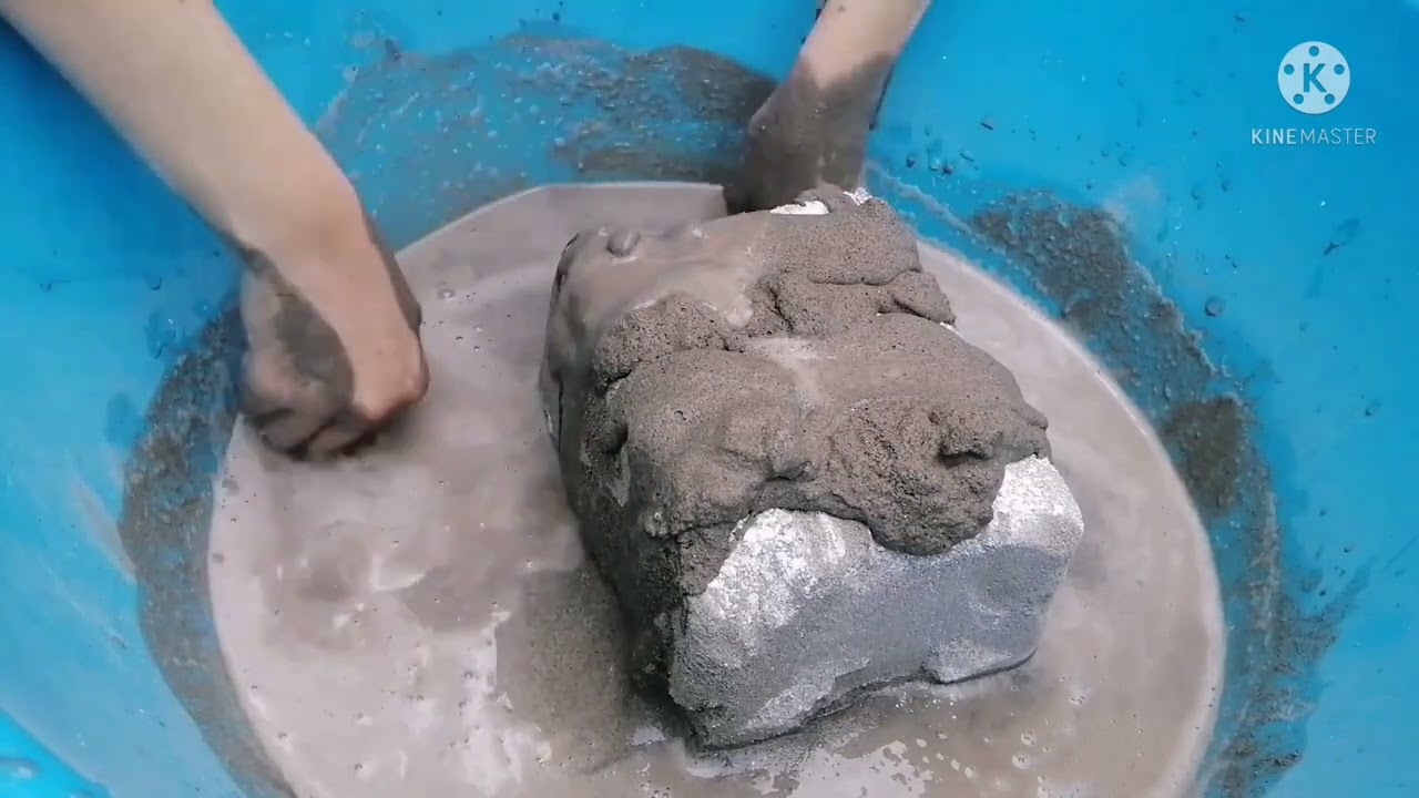 Soft sand crumbles in water and dipping
