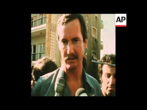 SYND 25 7 76 RED CROSS CHIEF DRIVES TO TEL ZAATAR CAMP