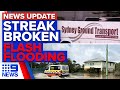 NSW breaks 13-day COVID free streak, towns lashed by rain and flash flooding | 9 News Australia