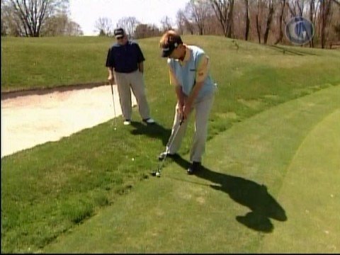 Brad Faxon (Hitting Down on the Putt).