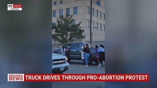 Truck drives through pro-choice protest