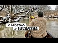 Canoeing a River in Snow