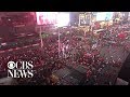 Motorcycle backfiring sparks "shooter" panic in New York's Times Square
