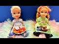 Elsa and Anna toddlers snack in their room