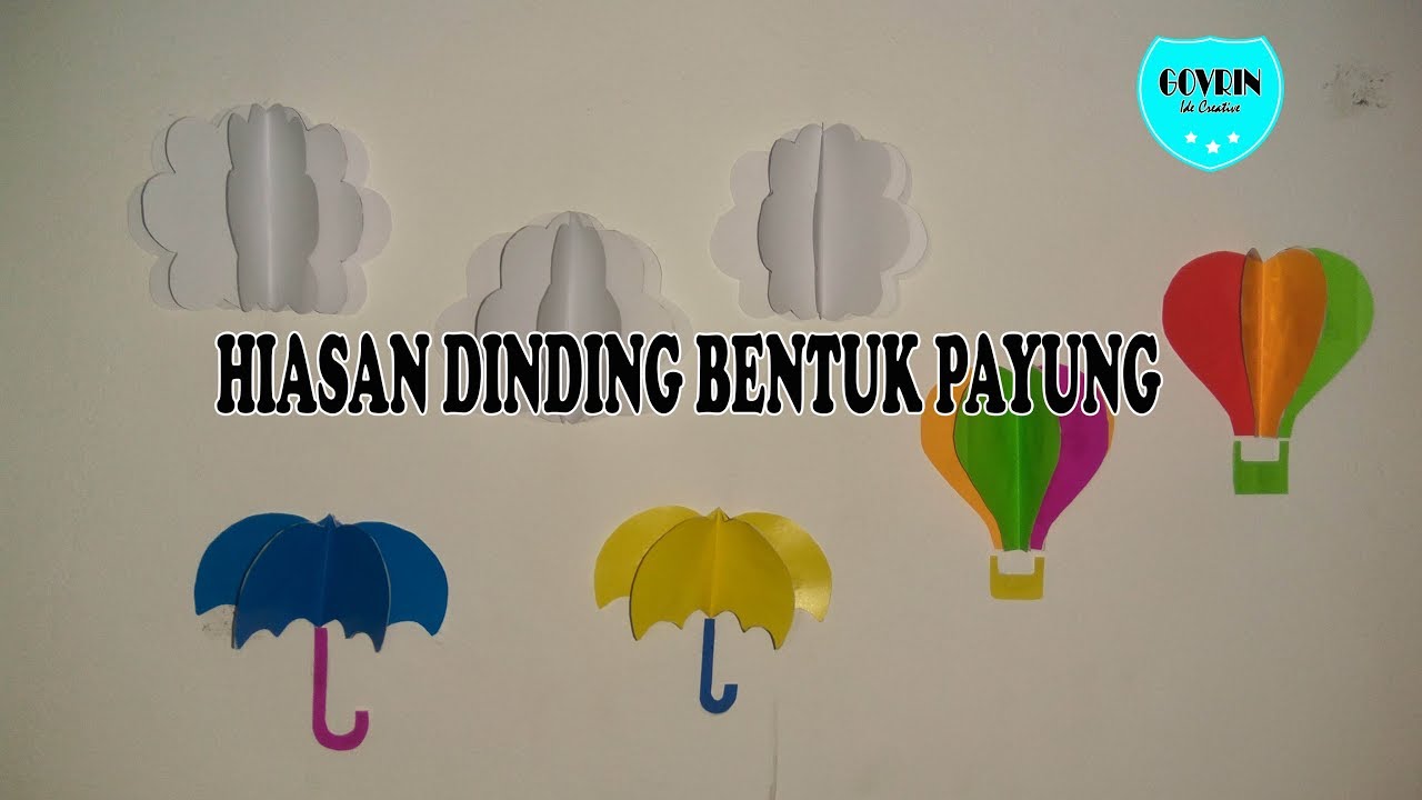  Dekorasi  kamar  dengan hiasan dinding  bentuk payung dari  