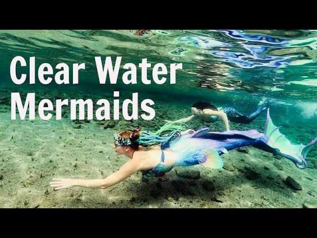 BEAUTIFUL MERMAID SWIMMING IN CRYSTAL CLEAR WATER 