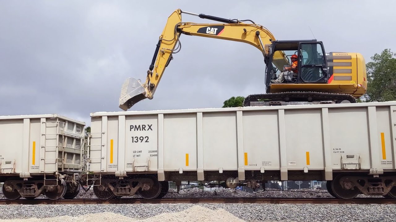 FEC / Brightline Roadbed Excavator Train near Pineda, FL - March 20, 2021