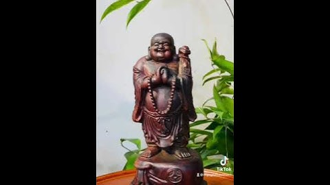 Tượng gỗ Di Lặc chúc phúc mang lại may mắn bình an