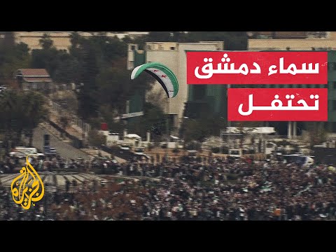 كاميرا الجزيرة ترصد العروض الجوية في سماء العاصمة السورية دمشق
